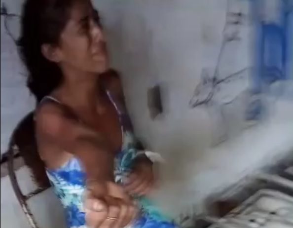Woman punished with broken arms for stealing in Favela Brazil Photo 0001