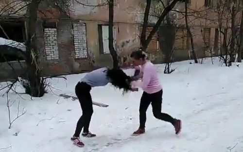 Womens fight ends with several kicks in the face Photo 0001