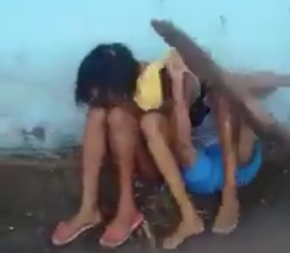 Young couple being beaten with sticks in Brazil Photo 0001