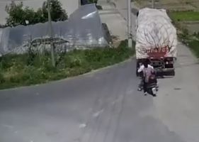 Guys on a motorcycle were hit by a truck Photo 0001