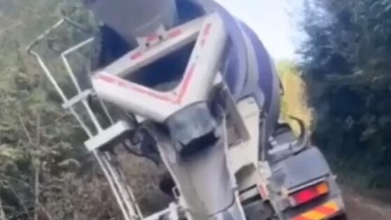 Badly parked cement truck falls downhill Photo 0001 Video Thumb