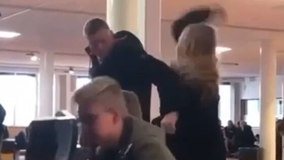 Man beats woman for a chair Photo 0001 Video Thumb