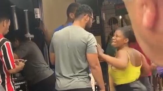 Woman punches man in the face during street fight in Brazil Photo 0001 Video Thumb