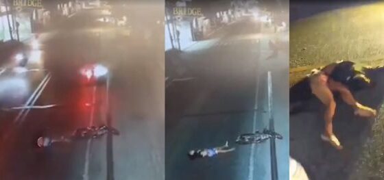 A motorcyclist falls from a motorcycle and is run over by a bus dying instantly and having his organs thrown onto the asphalt Photo 0001 Video Thumb