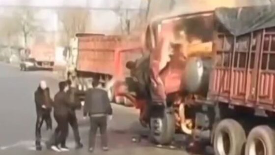 Chinese driver stuck in burning red truck Photo 0001 Video Thumb