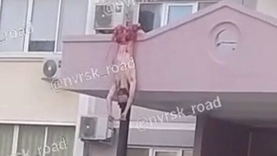 Suicide man has his body split in half after falling on top of balcony in russia Photo 0001 Video Thumb