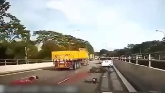 Truck strikes motorcyclist Photo 0001 Video Thumb