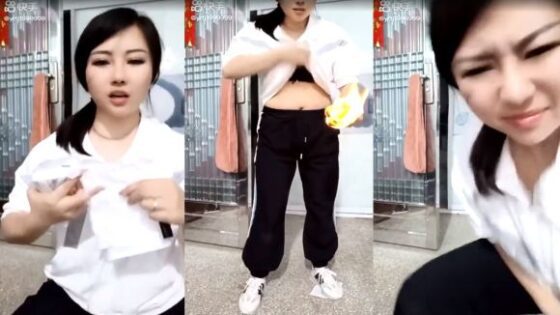 Chinese woman puts lighted paper in her pants Photo 0001 Video Thumb