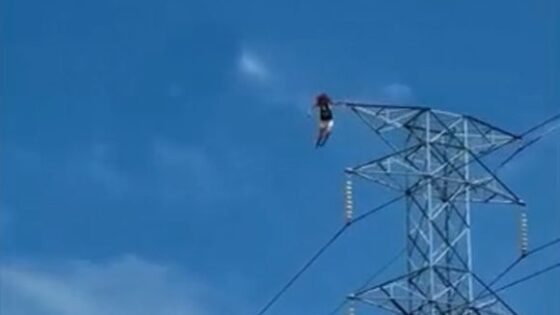 Girl jump from high electric tower Photo 0001 Video Thumb