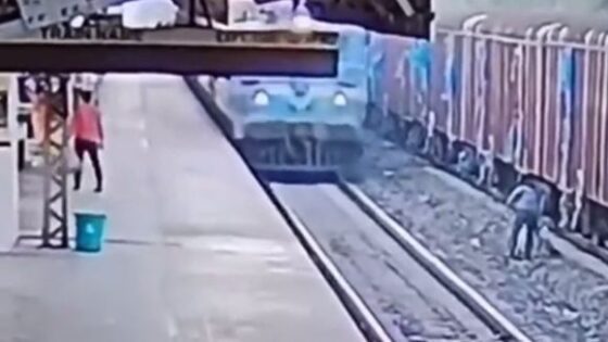 Indian railways employee saves man from run over by train Photo 0001 Video Thumb