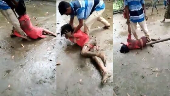 Man beat woman in muddy street Photo 0001 Video Thumb