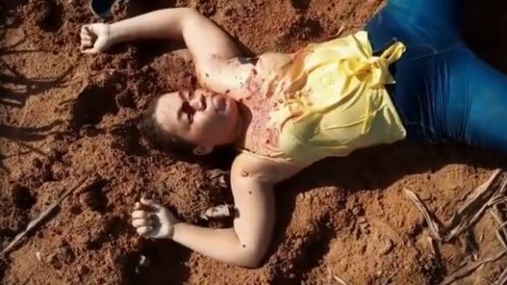 Woman found dead with arms and legs spread out on the ground somewhere in brazil Photo 0001 Video Thumb