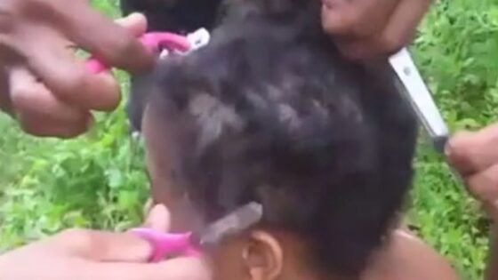 Woman punished with haircut and beat using sticks Photo 0001 Video Thumb