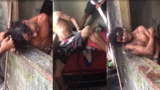 Alleged thief being brutally attacked as punishment for a possible crime committed in the favela Photo 0001 Video Thumb