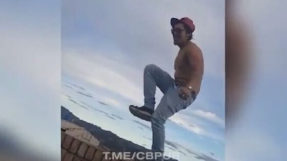 Man dancing on the wall building falling down Photo 0001 Video Thumb