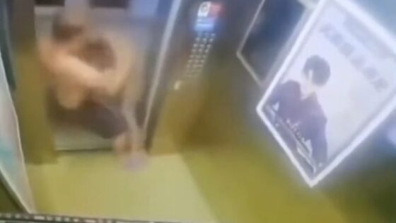 Man sexually harassing woman inside elevator in china Photo 0001 Video Thumb
