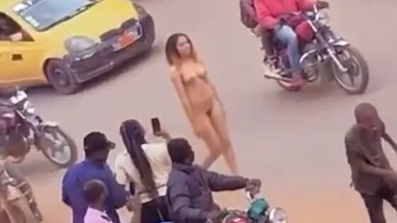 Woman walking in public areas with no clothes Photo 0001 Video Thumb