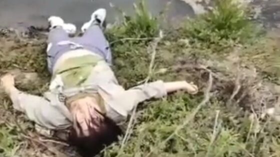 Body of drowned person is pulled from river in asia Photo 0001 Video Thumb