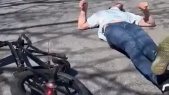 Man on bicycle falls and becomes unconscious Photo 0001 Video Thumb