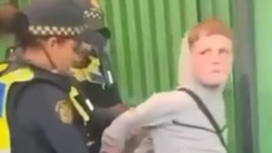Young kid spits on a female officer Photo 0001 Video Thumb