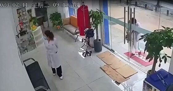 Glass door falling crashing clinic worker Photo 0001 Video Thumb