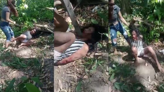 Woman being brutally beaten by female gang member in favela in brazil Photo 0001 Video Thumb