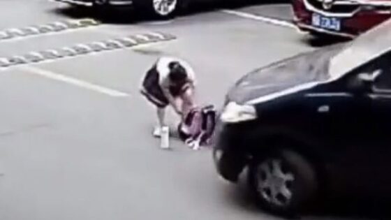 Child is run over by black car and caught on surveillance camera Photo 0001 Video Thumb