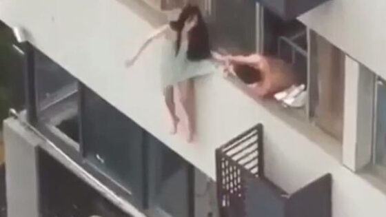 Chinese girl jumps from apartment Photo 0001 Video Thumb