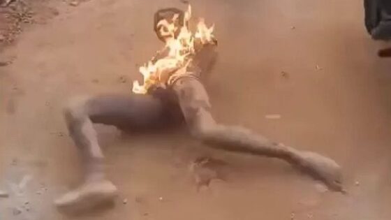 Men caught and stripped then burned alive Photo 0001 Video Thumb