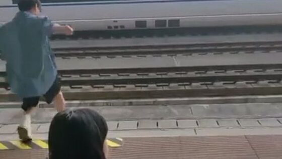 Wtf man jumps on high speed train railway Photo 0001 Video Thumb