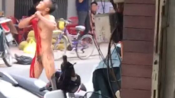 Man with psychiatric problems tries to cut his own neck in a suicide attempt in broad daylight in the middle of the street in vietnam Photo 0001 Video Thumb