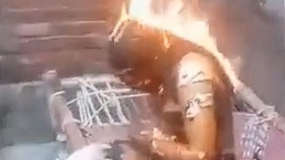 Woman is burned alive by members of her own family and is filmed while burning Photo 0001 Video Thumb