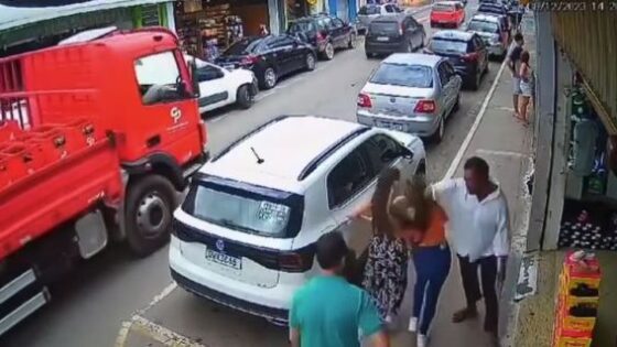 Crazy man punches woman in the face while walking down the street in brazil for an apparent reason Photo 0001 Video Thumb
