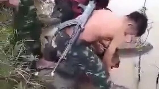 Mans neck is cut with kitchen knife and left to bleed to death in myanmar in horrific and abominable partial decapitation Photo 0001 Video Thumb
