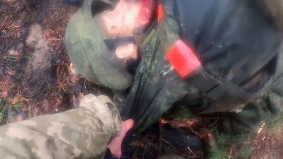 Russian soldier killed in combat has his belongings stolen by enemy soldiers on the battlefield Photo 0001 Video Thumb