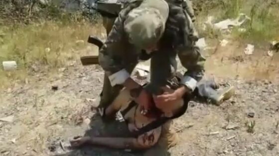 Taliban fighter beheads an alleged civilian for reasons still unknown allegedly in pakistan Photo 0001 Video Thumb
