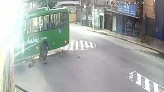Crash between motorcycle and bus in brazil leaves man with crushed head cctv view Photo 0001 Video Thumb