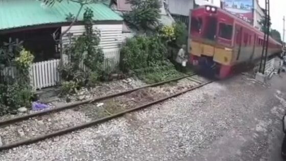 Old lady hit by train is captured by a camera lens Photo 0001 Video Thumb