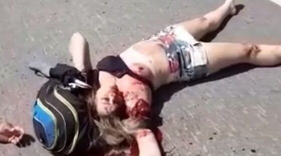 Woman dying on the ground after being the victim of a traffic accident in brazil Photo 0001 Video Thumb