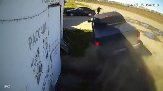 Car flies at great speed to parked passenger car in russia Photo 0001 Video Thumb