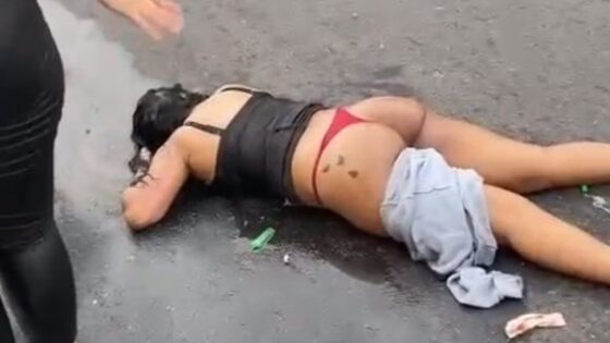 Couple suffers motorcycle accident and woman is left undressed on the ground in colombia Photo 0001 Video Thumb