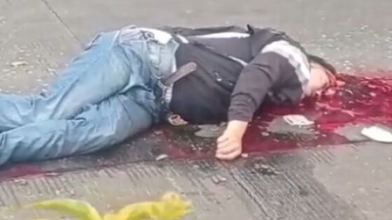 Exploded head and blood spurting in motorbike traffic accident Photo 0001 Video Thumb
