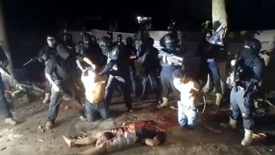 Members of a rival cartel are beheaded with a giant machete and their blood falls to the ground Photo 0001 Video Thumb