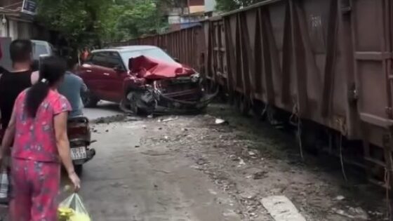 Car is hit by train in some asian country Photo 0001 Video Thumb