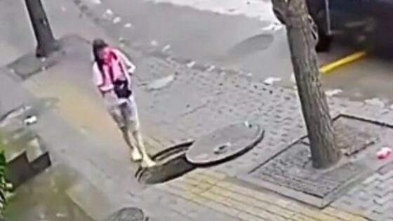 Girl walks towards endless fall in china Photo 0001 Video Thumb