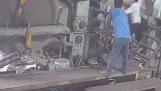 Man is brutally swallowed by industrial machine Photo 0001 Video Thumb
