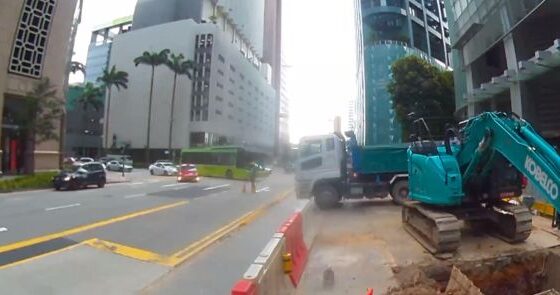 Worker is hit by bus but manages to walk away Photo 0001 Video Thumb
