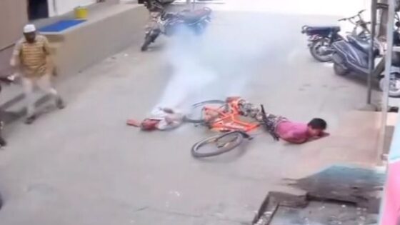 Children on bicycles being cut alive when they touch a high voltage wire Photo 0001 Video Thumb