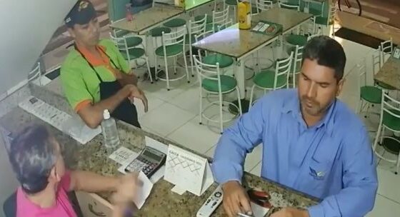Man using cell phone in cafeteria is killed with a gunshot to the head and doesnt even realize what happened Photo 0001 Video Thumb