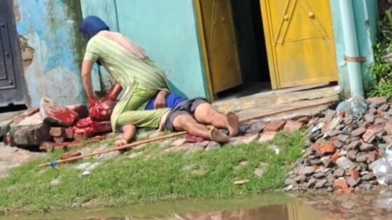 Woman playing with her husbands brain after his skull was opened by her who killed him Photo 0001 Video Thumb